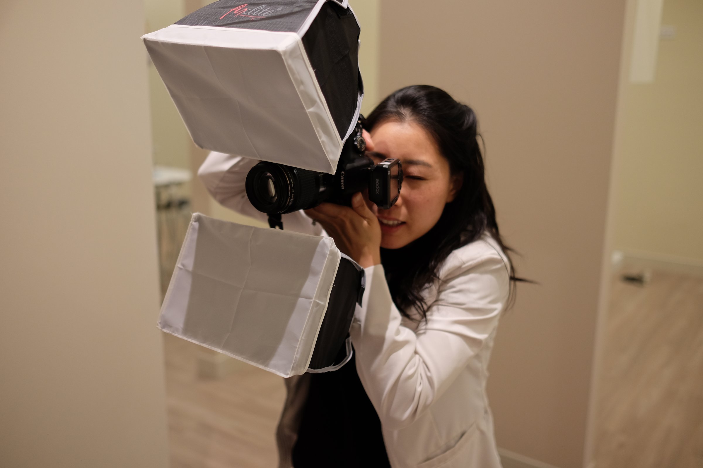 Dr. Erin Cho with the camera she uses to photograph smiles